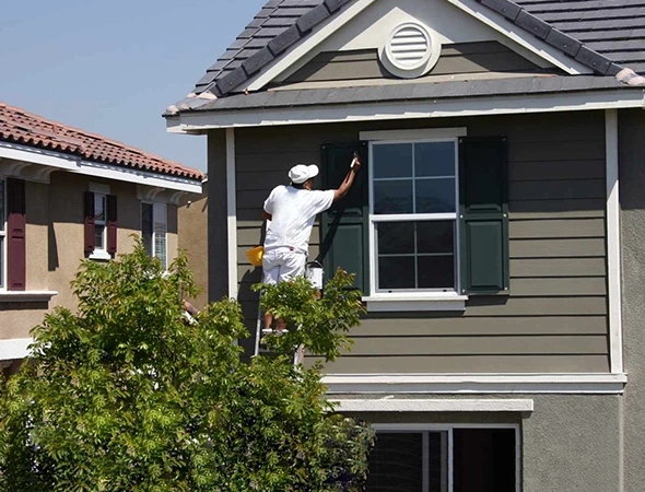 Professional exterior painting team delivering long-lasting results on a Florida home exterior.