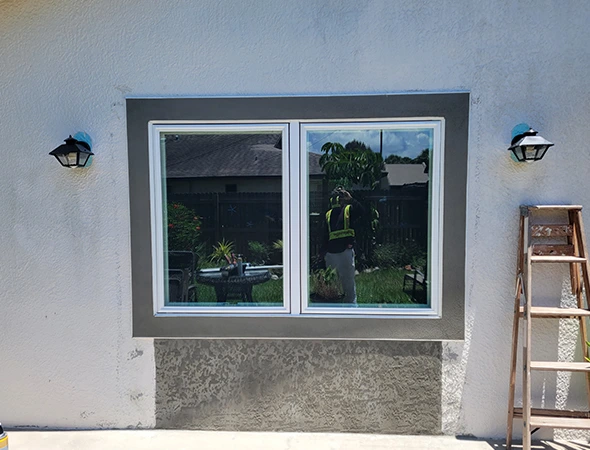 High-quality exterior home painting project in the Palm Bay area, Florida – durable paint job boosting home appearance.